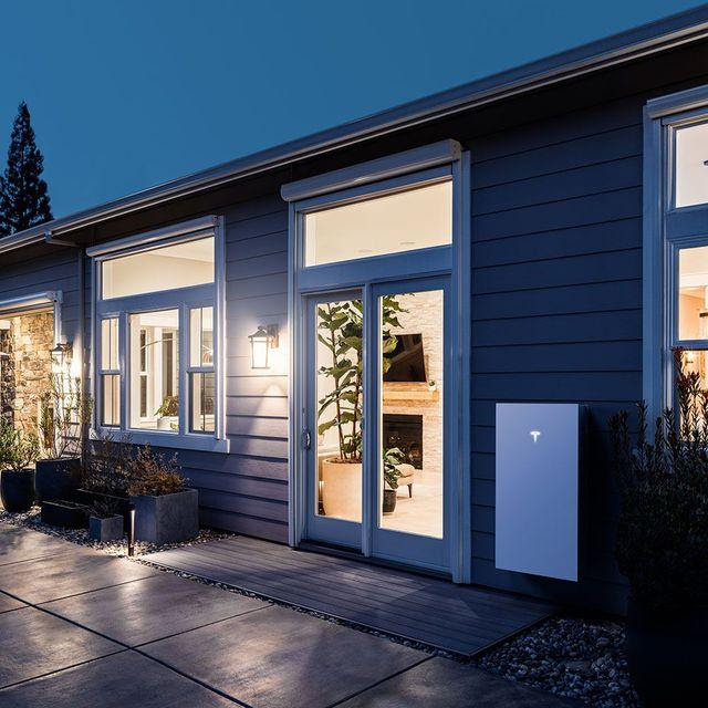 Illustration accompanying a comparison of Tesla Solar Roof and conventional rooftop solar costs