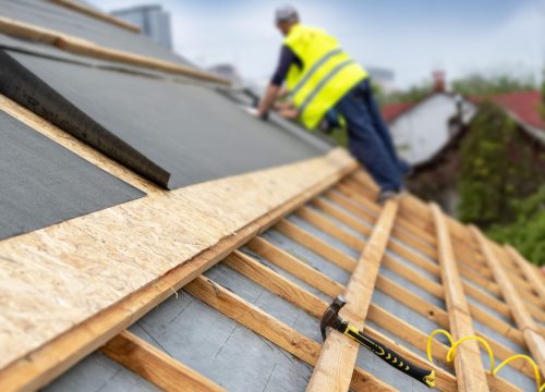 building-construction-process-new-wooden-roof-wood-frame-house-min