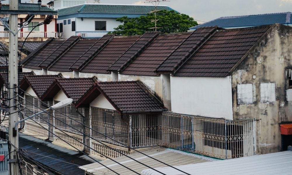 high-angle-view-roof-building-against-sky-min