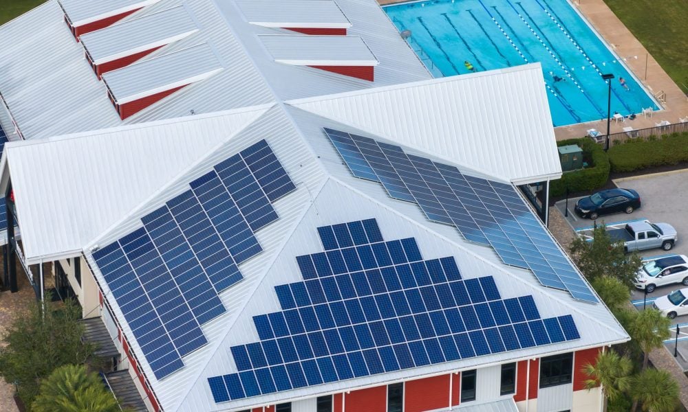 solar-rooftop-commercial-center-florida-photovoltaic-panels-producing-clean-ecological-electrical-energy-city-urban-area-concept-autonomous-building-min