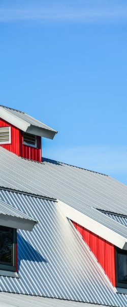 top-roof-red-barn-blue-sky-background-min
